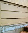 an old-fashioned crawl space door in Brockway about to be replaced