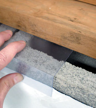 Block wall clear covering for wet crawl spaces in Wellsville