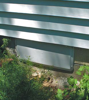A gray crawl space vent cover in Homer City