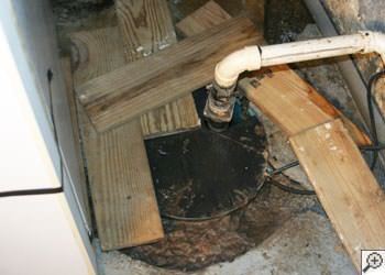 An ugly, clogged sump pump system in Saint Marys, Oil City, Franklin, Bradford, Punxsutawney, Clearfield, Clarion