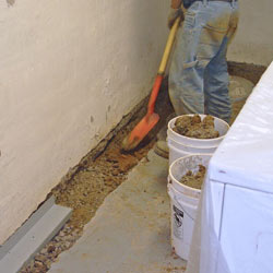 Digging a trench for a French Drain system in Du Bois