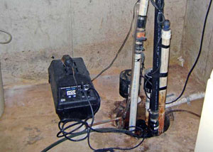 Pedestal sump pump system installed in a home in Salamanca