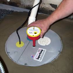 A newly installed sump pump system in a basement in Cuba