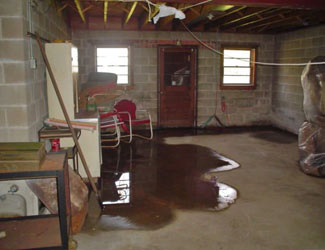 a flooded basement floor in a Randolph home