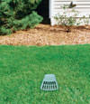 A buried gutter drain downspout extension installed in a Randolph home
