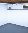 Warren, PA and NY wet basement wall covering that tucks into a perimeter drainage system