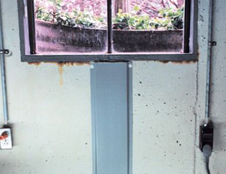 Repaired waterproofed basement window leak in Oil City
